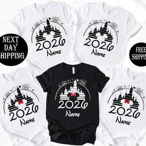 a collection of white t-shirts with black and red designs featuring Mickey Mouse and a castle, along with the text "2020 Name" printed on them.