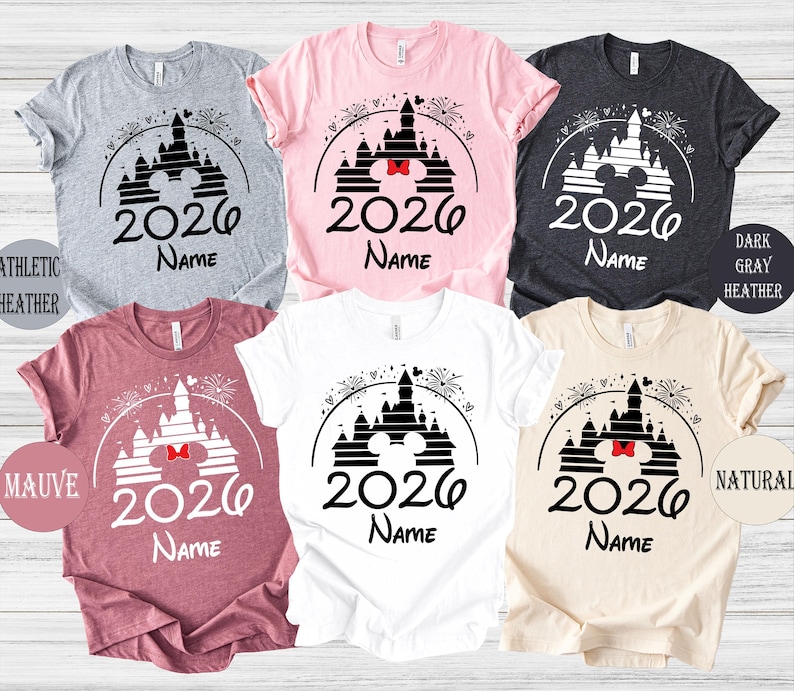 a collection of six t-shirts, each featuring a unique design related to the year 2020. The t-shirts are arranged in a grid pattern, showcasing various color options and styles.