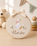 Baby name sign embroidered with storybook goose and florals, Nursery Wall Decor Custom Baby Ornament Baby Shower Gift, Gift for Newborn product logo