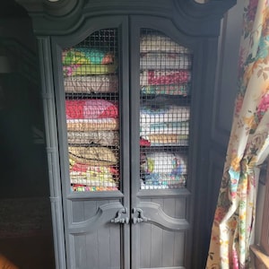 Quilt chest outlet with glass front