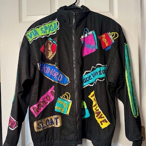 May include: A set of three ceramic mugs with a speckled, matte finish. The mugs are in shades of cream, light gray, and dark gray. Each mug has a simple, minimalist design, perfect for coffee or tea.