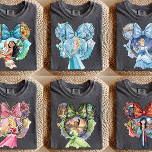 May include: A set of three ceramic mugs with a speckled, matte finish. The mugs are in shades of cream, light gray, and dark gray. Each mug has a simple, minimalist design and a rounded handle. The mugs are stacked on top of each other.