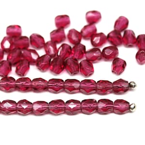 Cuentas redondas facetadas de cristal checo de 4 mm, color rosa fucsia oscuro, pulidas al fuego, 50 unidades - 5701