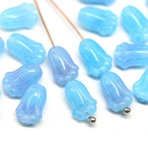Blauwe Tsjechische glastulpkralen: roze hint, 12 x 8 mm (20 stuks)