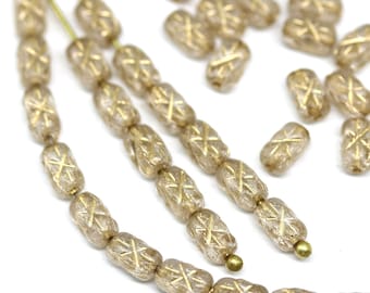 Clear czech glass rice beads Golden stars ornament 6x4mm small oval barrel beads, 50pc - 3755