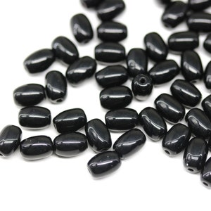 7x5mm Jet black rice beads, oval Czech glass pressed barrel beads 50pc - 0666