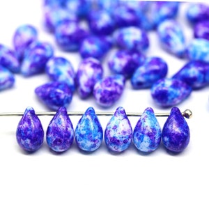 6 x 9 mm violetblauwe Tsjechische glazen druppelkralen, heldere druppeltjes aan de bovenkant geboord, 40 stuks - 0441