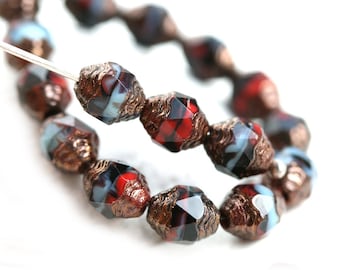 Tsjechische vuurgepolijste loopkralen: zwart rood blauw met gouden uiteinden (15 stuks)