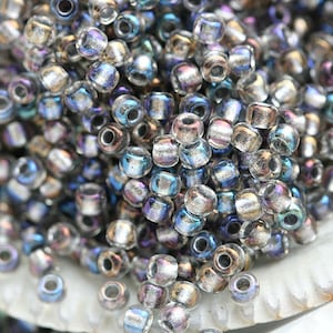 Toho Seed Beads 11/0: Crystal Opaque Gray with Gold Luster (10g)