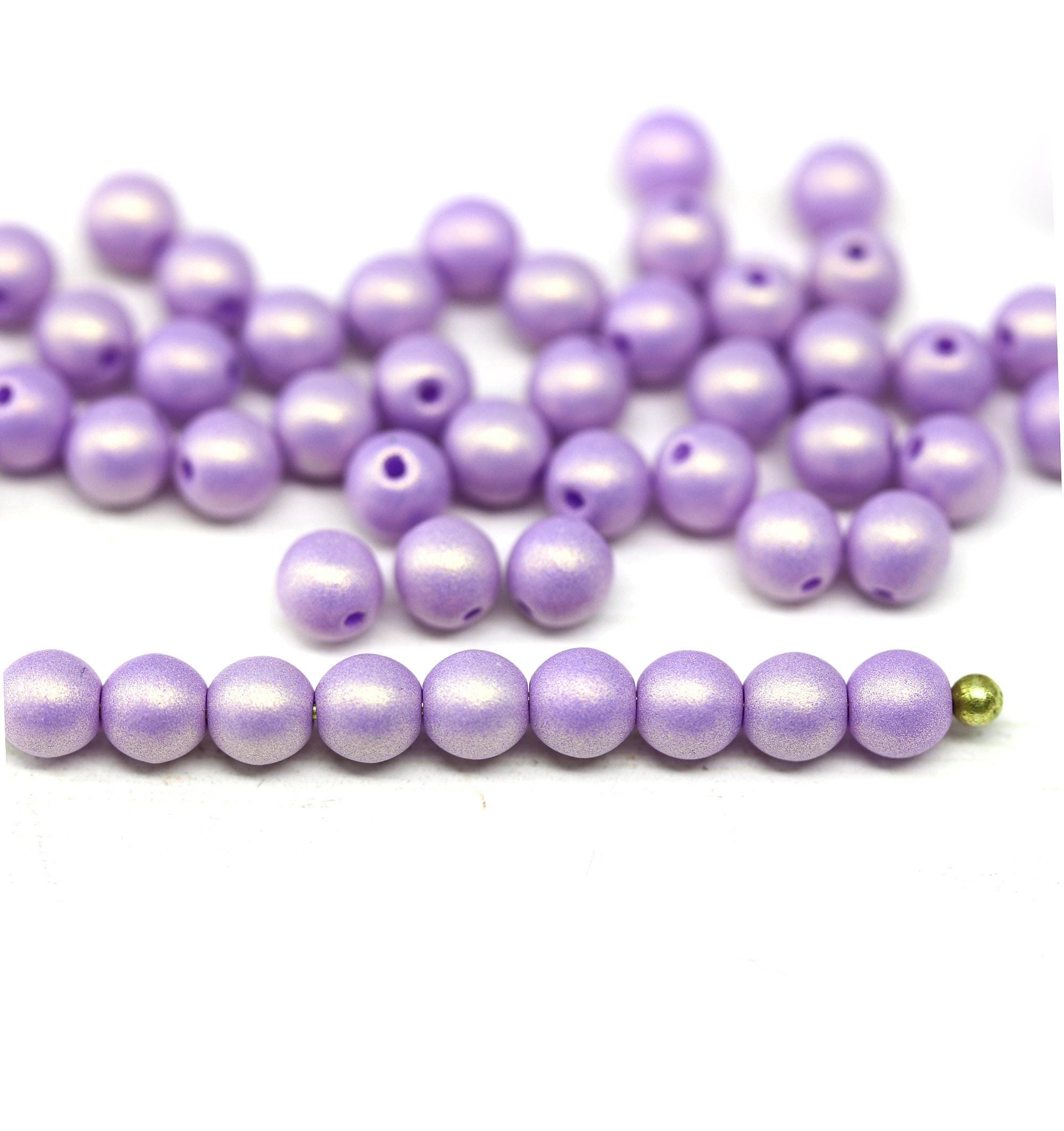 Boîte de 220 perles en bois rondes + fil nylon élastique - Beige - D6/8 Boîte de 220 perles en bois rondes + fil nylon élastique - Beige - D6/8
