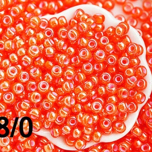 Cuentas Toho de color naranja, tamaño 8/0, interior jacinto blanco forrado N 957 - 10 g - S823