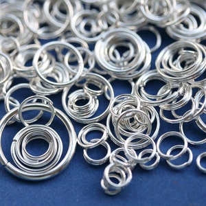 300 st silverpläterade hoppringar, blandning: enkla och dubbla öglor, 4-20 mm