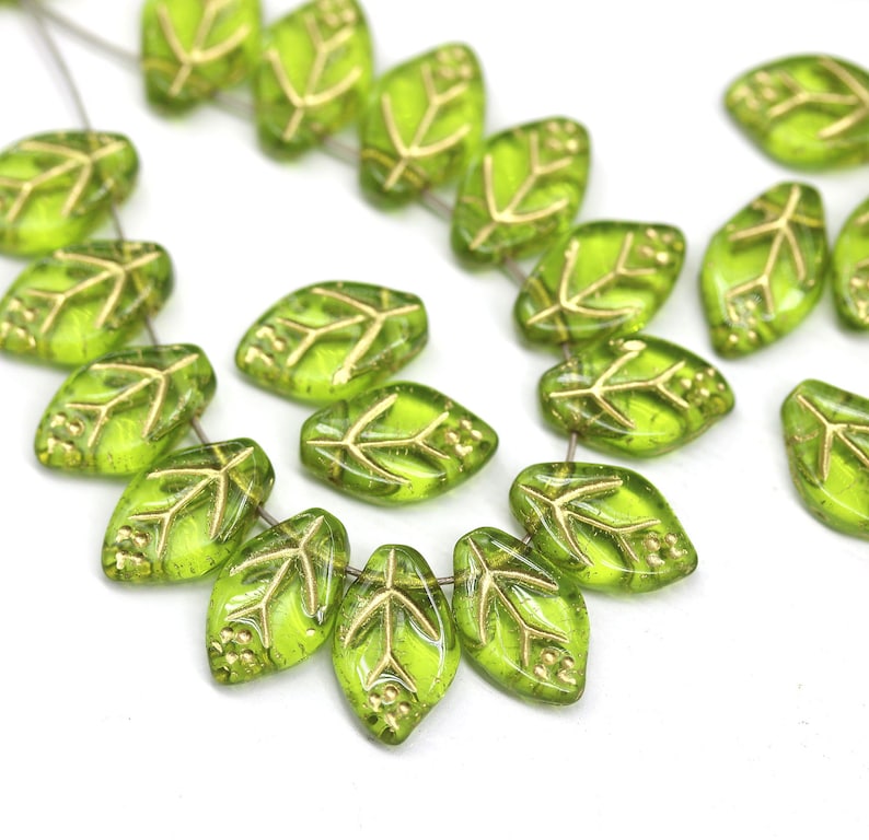 12x7mm Olive green leaf beads Gold wash Czech glass pressed olivine leaves 30Pc 3676 image 1