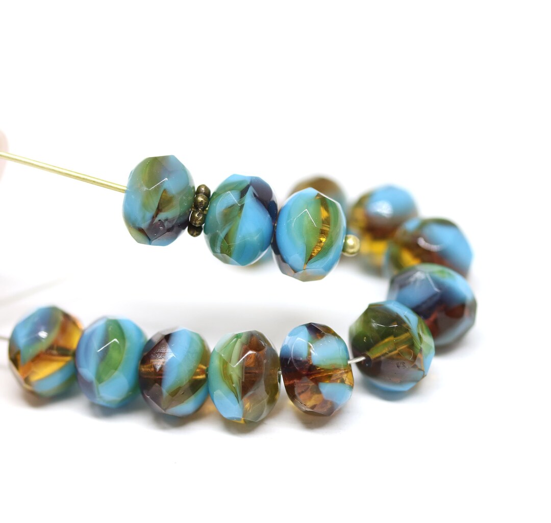 thumbnail image 2 of 50 Czech Glass Donut Beads 8x2.5mm – Iris Blue, Pressed Glossy Finish 2 of 6