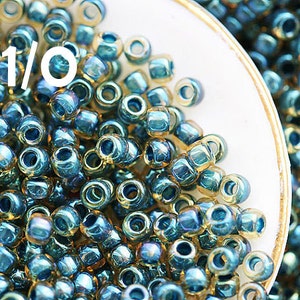 Toho seed beads size 11/0 Inside color Rainbow Topaz Opaque Emerald Lined N 243 - 10g - S222