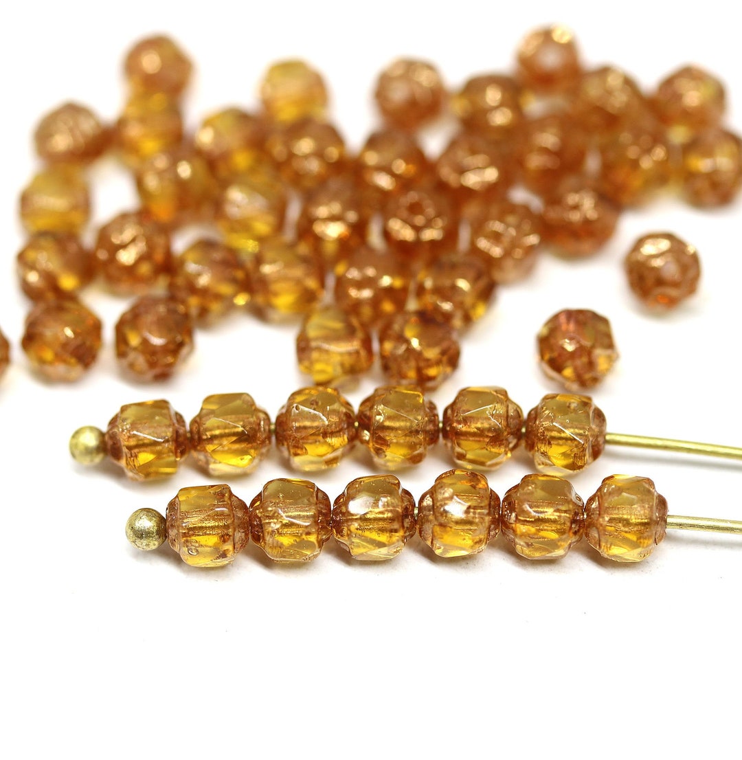 Perle di vetro ceco color topazio chiaro da 4 mm: sfere sfaccettate ...