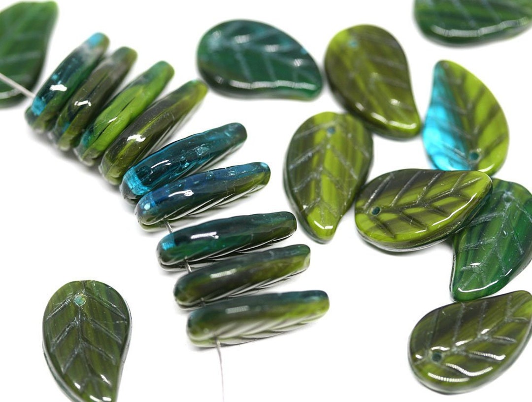Czech glass wavy leaf beads 20pc translucent light green 14x9mm
