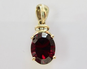 Vintage 9ct Gold Oval Garnet and Diamond in a Heart Mount Pendant