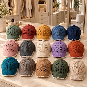 May include: A collection of fifteen baseball caps made from crocheted yarn in various colors including green, red, yellow, blue, navy, pink, gray, cream, purple, orange, teal, brown, tan, and beige, each featuring a distinct textured pattern.