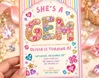 May include: A rectangular birthday invitation card with a pastel striped border. The text reads: SHE'S A GEM, JOIN US FOR A DAY FULL OF SPARKLE & SHINE! OLIVIA IS TURNING 6! SATURDAY, DECEMBER 28TH, 2:00-4:00 PM, 789 SPARKLE STREET, NEW ORLEANS, LA, RSVP TO OLIVIA'S MOM AT 123-456-7890. The letters are filled with colorful faux gems, pearls, and small bows.