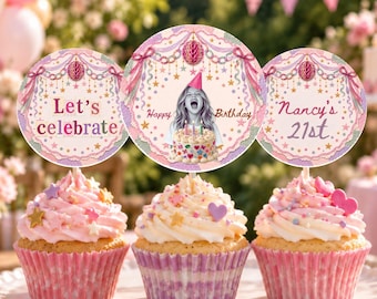 May include: Three cupcakes with pink frosting and star-shaped sprinkles, each topped with a circular card. The cards feature pastel pink and purple scalloped borders, hanging decorations, and text reading Let's celebrate, Happy Birthday, and Nancy's 21st.