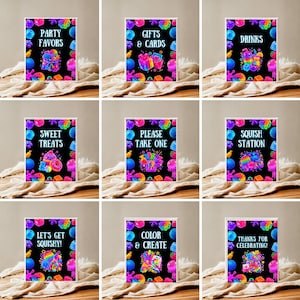 May include: A set of nine rectangular signs with black backgrounds and colorful pop-it toy graphics. Each sign features bright text including Party Favors, Gifts & Cards, Drinks, Sweet Treats, Please Take One, Squish Station, Let's Get Squishy, Color & Create, and Thanks for Celebrating.