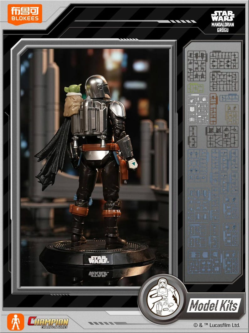 K&ouml;nnte beinhalten: Ein Star Wars Mandalorian Grogu Modellbausatz. Die Figur hat einen silbernen Helm, schwarze R&uuml;stung und einen Umhang. Das Set enth&auml;lt Grogu und wird auf einer schwarzen Basis mit dem Star Wars-Logo pr&auml;sentiert. Die Box zeigt auch die Modellbausatzteile.