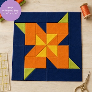 May include: A square quilt block with a starburst design in orange, yellow, and green on a navy blue background. The block measures 12.5 inches by 12.5 inches. The image includes a ruler, scissors, and a spool of orange thread.