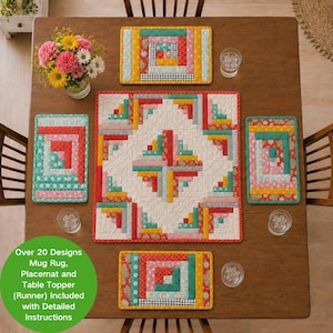 May include: A set of quilted fabric items including one square table topper and three rectangular placemats, all featuring a colorful log cabin patchwork pattern in shades of red, yellow, teal, and white, arranged on a wooden table surface.