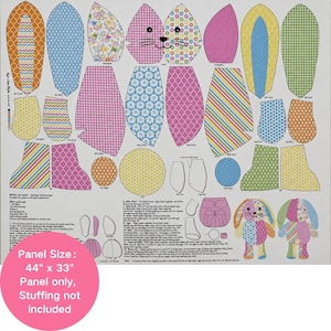 May include: A fabric sewing panel for a stuffed bunny toy featuring various colorful patterned shapes including ears, arms, legs, and a face. The panel includes printed instructions and a finished toy illustration, measuring 44 inches by 33 inches.