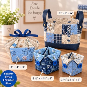 May include: Four fabric baskets in blue and beige floral patterns. One large basket with handles measures 6" x 8" x 6". One basket with a bow measures 4" x 4" x 3". Two square baskets with buttons measure 4.5" x 4.5" x 4" and 3.5" x 3.5" x 3".