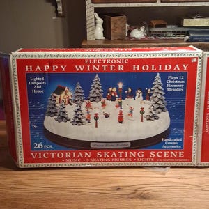 Mr Christmas Holiday Skaters - Etsy