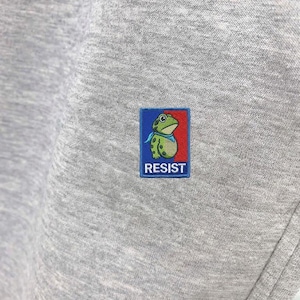 May include: A set of three ceramic mugs with a speckled, matte finish. The mugs are in shades of cream, light gray, and dark gray. Each mug has a simple, minimalist design, perfect for coffee or tea.