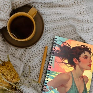 Sea-inspired wellbeing journal with wild swimmer artwork, perfect gift for open water swimmers and sea lovers..