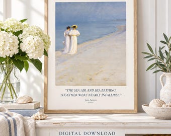 May include: A framed art print featuring a painting of two figures in white dresses standing on a sandy beach by the ocean. Below the image, the text reads: THE SEA AIR AND SEA BATHING TOGETHER WERE NEARLY INFALLIBLE. Jane Austen, Sanditon.