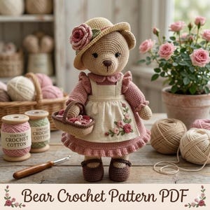 Op de afbeelding: Een gehaakte teddybeer met een hoed met roos, een roze jurk en een schort met bloemenborduurwerk. De beer houdt een klein mandje vast. De afbeelding bevat spoelen vintage haakkatoen en de tekst "Bear Crochet Pattern PDF".
