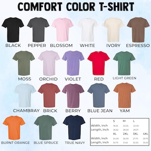 Pode incluir: Uma sele&ccedil;&atilde;o de camisetas Comfort Color em v&aacute;rias cores, incluindo preto, branco, vermelho e azul. A imagem exibe as camisas com seus nomes de cores e uma tabela de tamanhos. O texto "COMFORT COLOR T-SHIRT" est&aacute; no topo.
