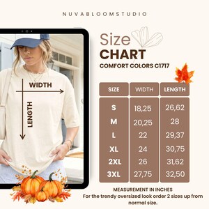 Peut inclure: Un tableau des tailles pour les t-shirts Comfort Colors C1717 pr&eacute;sentant un tableau avec des mesures de largeur et de longueur en pouces pour les tailles S &agrave; 3XL. Le graphique inclut du texte, un dessin de feuille et une image de t-shirt.
