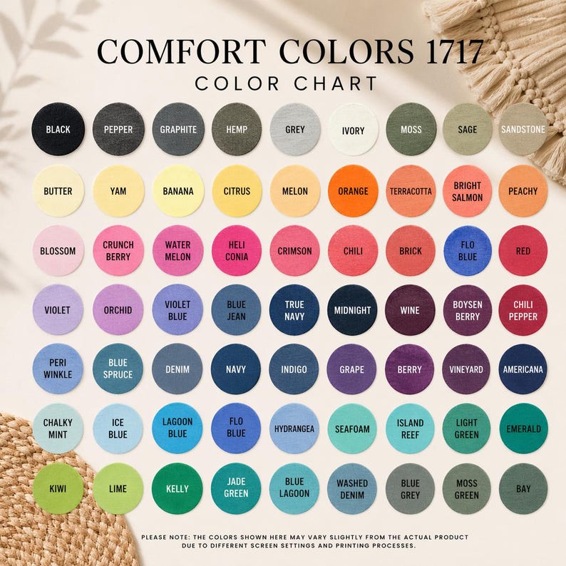 May include: A color chart titled "COMFORT COLORS 1717" displays a variety of fabric colors in circular swatches. Colors include black, grey, orange, blue, green, and more. The chart is for reference, with a disclaimer about color variations.