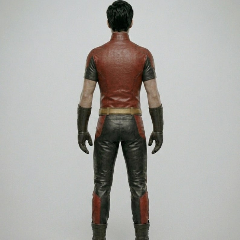 May include: A red and black costume with a high collar, short sleeves, and a gold belt. The pants are black with red accents. The costume includes gloves and boots. The person is facing away from the camera.