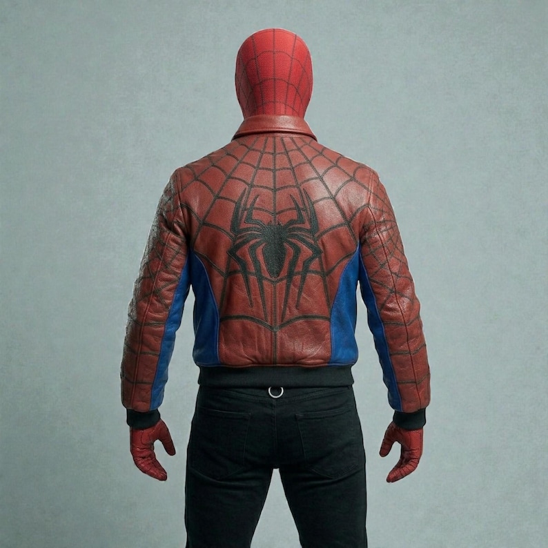 May include: Red and blue leather jacket with a black spiderweb and spider design on the back. The jacket has a bomber style with a black waistband and cuffs. The sleeves are red, and the sides are blue.
