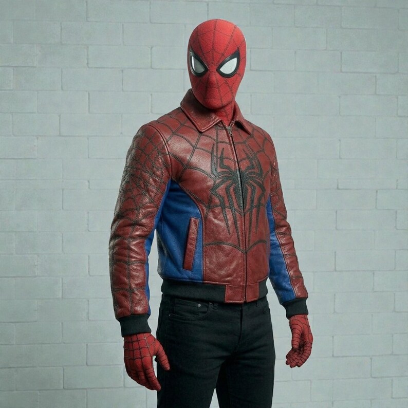 May include: A red and blue Spider-Man jacket with a black spider emblem on the chest. The jacket has a collar, a zipper, and blue panels on the sides. The person is wearing a matching red mask and gloves.