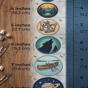 May include: A collection of embroidered patches, each with a unique design. The patches range from 3 to 8 inches in diameter. Designs include an anchor, mountain scene, nautical instrument, howling wolf, canoe, and a planet with rings.