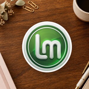 May include: A circular sticker featuring a glossy green background with a white border and the stylized white letters LM centered in the middle. The design has a metallic sheen and a three-dimensional appearance with soft shadows and highlights.