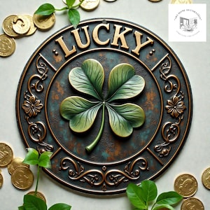 May include: A circular, bronze-effect metal plaque with the word "LUCKY" in gold lettering. The plaque features a detailed green four-leaf clover in the centre, surrounded by decorative scrollwork. Gold coins and green leaves are scattered around.