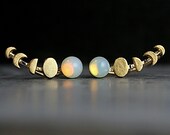 Moon Phase ear climbers. Ear crawler with vintage opal. Hand gilded gold ear climber waning and waxing moon.