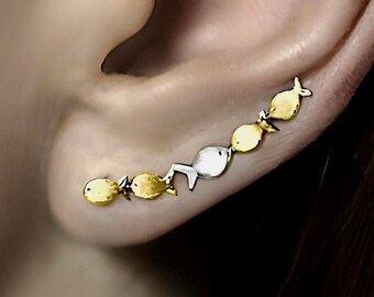 Against the current ear climbers. Dainty. Gold school of fish with one silver fish swimming upstream. Gift for her.