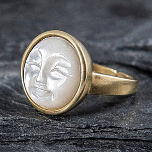 Gold carved shell moon face ring. Mother of pearl.