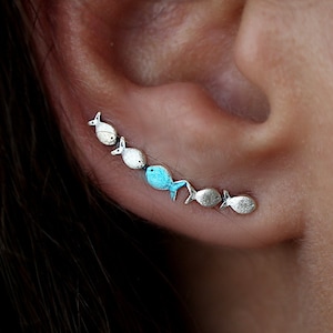 Against The Current ear climber. Against the tide with one blue turquoise fish swimming upstream. Sterling silver fish earrings. image 3