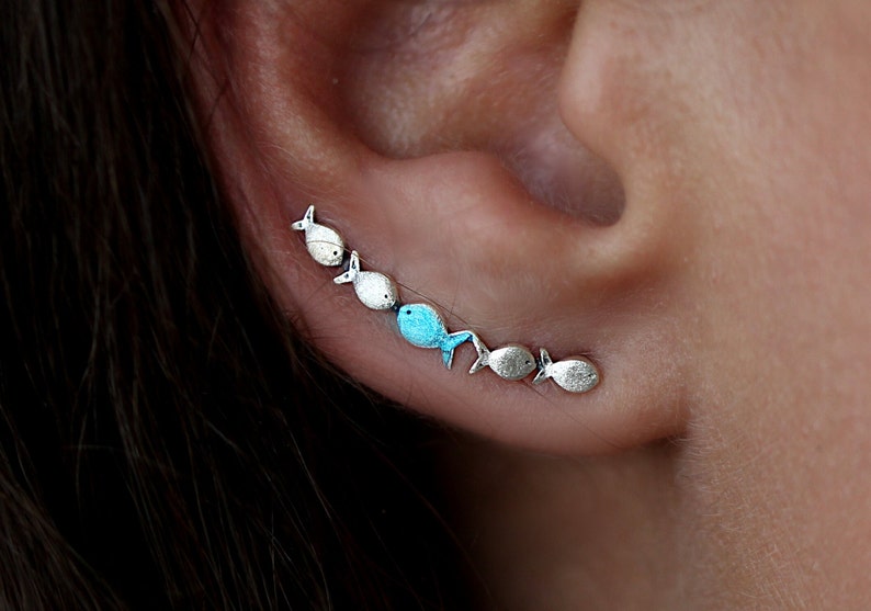 Against The Current ear climber. Against the tide with one blue turquoise fish swimming upstream. Sterling silver fish earrings. image 3